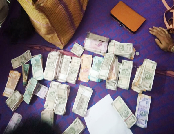Dibrugarh Police have seized 1.14 kg heroin, Rs 19.55 lakh cash from the house of a wanted drug peddler in Dibrugarh.