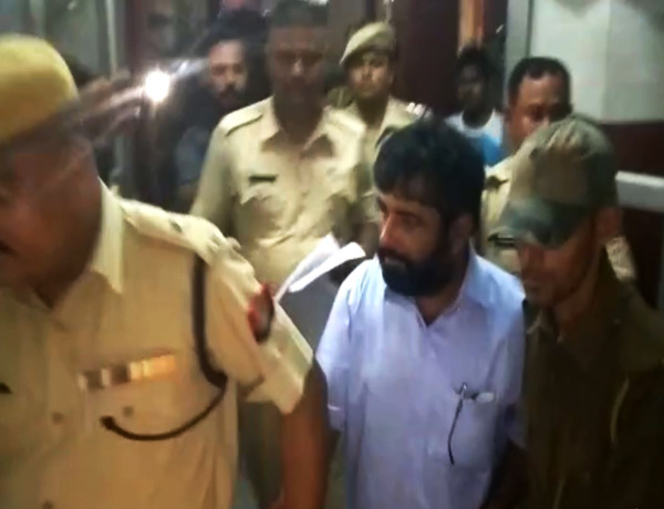 Nabarun Bhattacharjee was on the run and surrendered at Karimganj Sadar police station Sunday night.