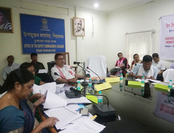 Jorhat MP Topon Kumar Gogoi chairing the District Development Coordination and Monitoring Committee (DISHA) meeting at the Sivasagar DC office.