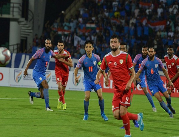 Players of India and Oman in action at the Sarusajai Stadium in Guwahati.