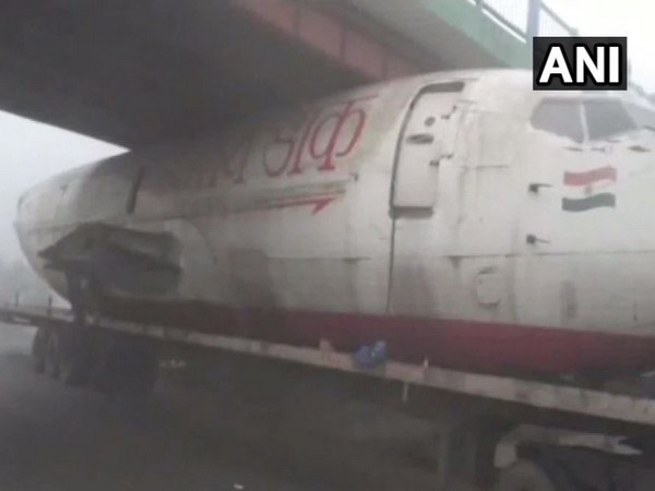 WB: Truck carrying abandoned India Post aircraft gets stuck under a bridge