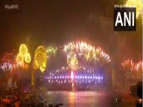 Australia rings in New Year with glittering fireworks at Sydney Harbour Bridge