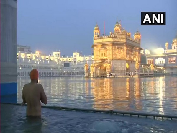 Amritsar: Devotees offer prayers at Golden Temple on Guru Gobind Singh's birth anniversary