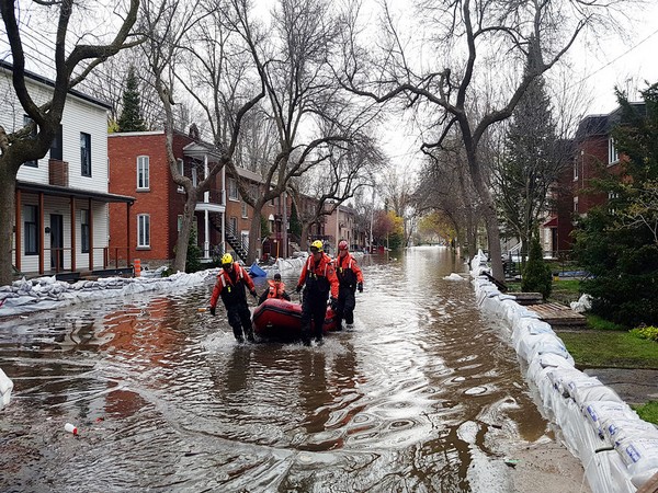 Flood warning issued for Toronto due to storm, 10 dead in US