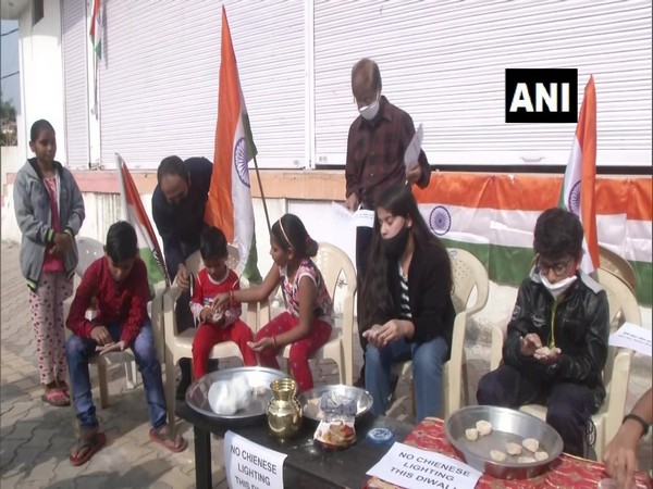 Children make earthen lamps in Jammu, boycott Chinese lights