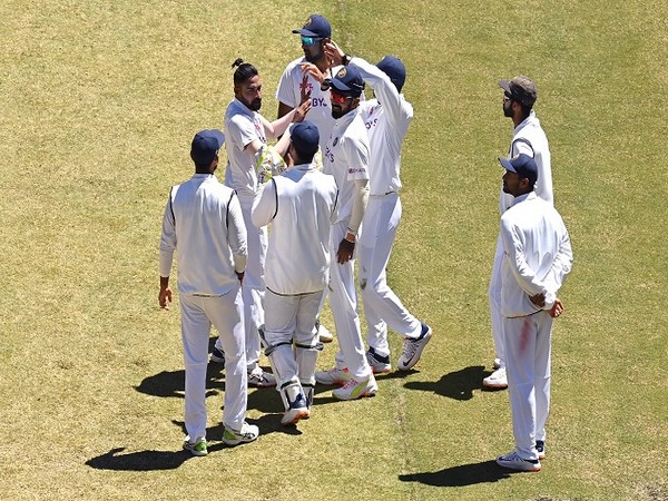 : No Virat Kohli, no Rohit Sharma, no Ishant Sharma, no Mohammad Shami and the humiliation of getting bundled out for 36 in the second innings of the first Test notwithstanding, Team India under stand-in skipper Ajinkya Rahane scripted a majestic comeback in the Test series against Australia as they won the second Test at the Melbourne Cricket Ground by eight wickets on Tuesday. Chasing 70 for a win, it was only poetic justice that Rahane hit the winning run of Nathan Lyon as the series stands 1-1 with two Tests remaining. The win not only brings India right back in the series, but also a step closer to the final of the World Test Championship. While no word is enough to describe the heroics of skipper Rahane, one man who deserves special praise is opener Shubman Gill. Brought into the team after first-choice opener Prithvi Shaw failed in the opening game, Gill showed application in both essays and was unbeaten with skipper Rahane (27) when India crossed the line. His unbeaten 35 off 36 balls will stand India in good stead with Rohit set to start the third game. Mayank Agarwal's poor show continued as he once again failed to grab the opportunity and was dismissed for just 5 as India chased 70 for a win on the fourth afternoon. Cheteshwar Pujara also failed to rise to the occasion and was dismissed for just 3 by Cummins. But that is a worry the team management will look into ahead of the next game. For now, it is one inspired show by the Indian boys when critics in Australia had called it a 4-0 series win after the loss in Adelaide. Standing in, Rahane ensured he got counted and as Sunil Gavaskar rightly mentioned, his 12th Test century was one of the most important ones in the history of Indian cricket because a sizeable lead was must to ensure that Indian bowlers don't see their first-innings show go in vain. While Rahane still feels his century at the Lord's is his best showing, the Indian bowlers who saw the team lose even after they bowled Australia out cheaply in the opening game would beg to differ. Coming back to the fourth day's play, riding on the back of the confidence from day three, India first dismissed Australia for 200 and then came back to chase the target of 70 in just 15.5 overs. If one session had cost India the first Test, it was again a session -- which Rahane and Ravindra Jadeja weathered on day two - that saw India bag the second game. However, the win wasn't as easy as it shows on paper. Pat Cummins and Mitchell Starc gave Australia the early wickets to ensure the win won't be a cakewalk for the visitors. Starc dismissed Mayank while Cummins sent Pujara back as a small target started looking a little bigger. However, some assured strokeplay from Gill and Rahane calmed the nerves of India's dressing room. Earlier in the day, Mohammad Siraj struck twice while Jasprit Bumrah and Ravichandran Ashwin picked a wicket each in the first session as Australia folded for 200. Having weathered the storm in the first hour of play, it was Bumrah's bouncer that ended Cummins' stint at the crease after India took the new ball. If Bumrah provided India the breakthrough, it was Siraj's twin strike with the bouncers which ensured India maintain the advantage in the game. The first session was extended after Australia lost their ninth wicket and Starc ensured India toiled hard for the final blood. Brief Scores: Australia 195 and 200; India 326 and 70/2 (Shubman Gill 35*, Ajinkya Rahane 27*; Mitchell Starc 1-20, Pat Cummins 1-22) (ANI)