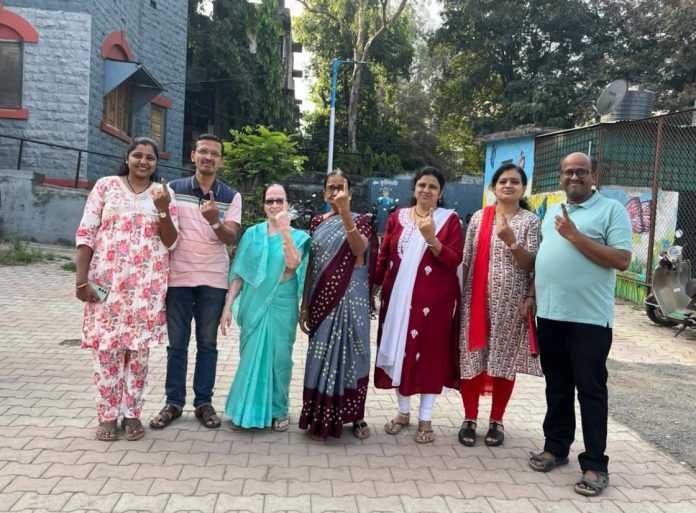 Voters exercise their franchise in Pune as Maharashtra votes in a single phase to elect a new government.