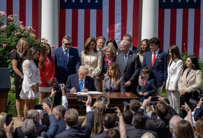 US President Donald Trump signs the 'Take it Down Act' along with first lady Melania Trump in the Rose Garden of the White House. (Image: 'X'/@FLOTUS)