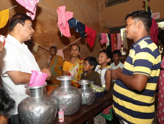 Assam CM Dr Himanta Biswa Sarma interacting with people at a relief camp in Silchar today (June 3).